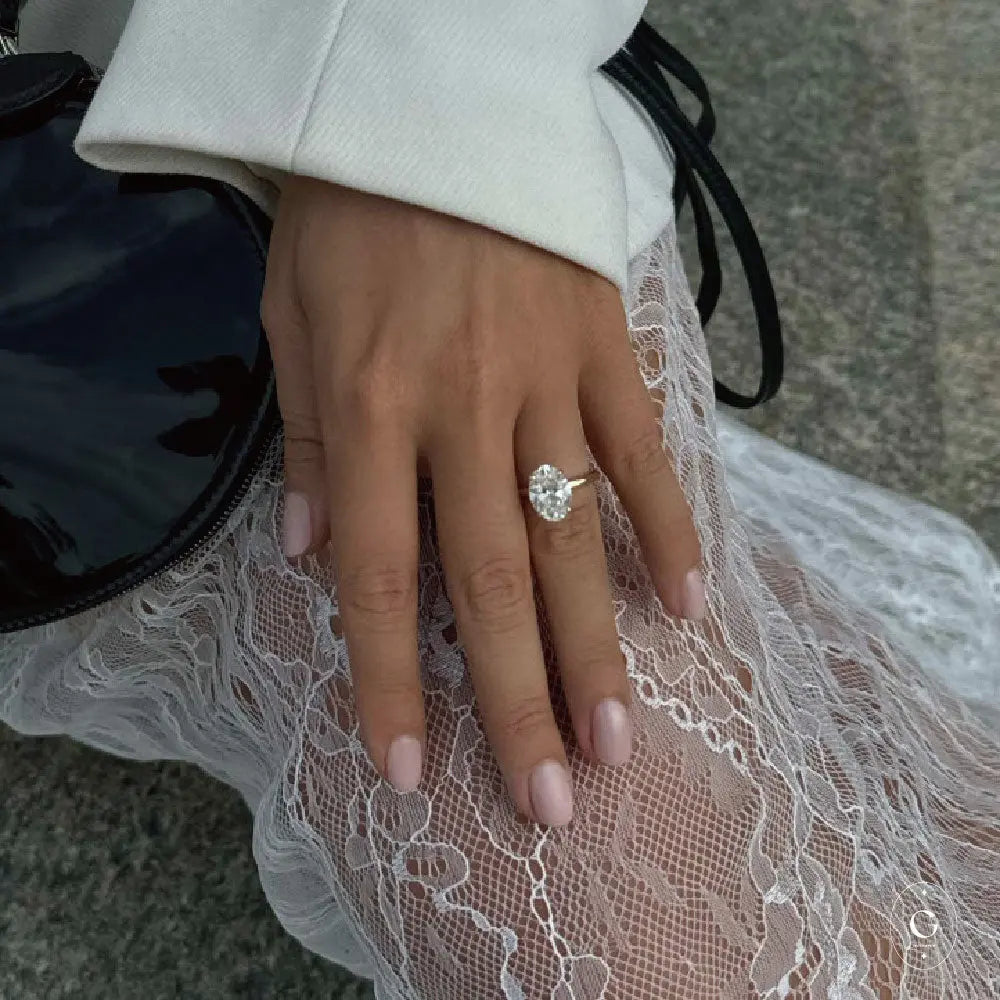 Gold Solitaire Ring with Moissanite Stone
