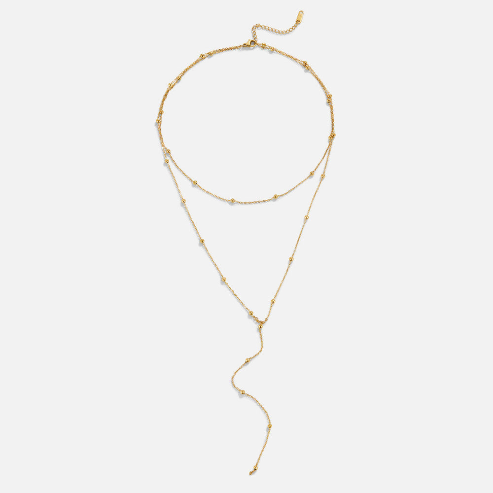Gold Layered Tassel Necklace with Multi-Strand Design