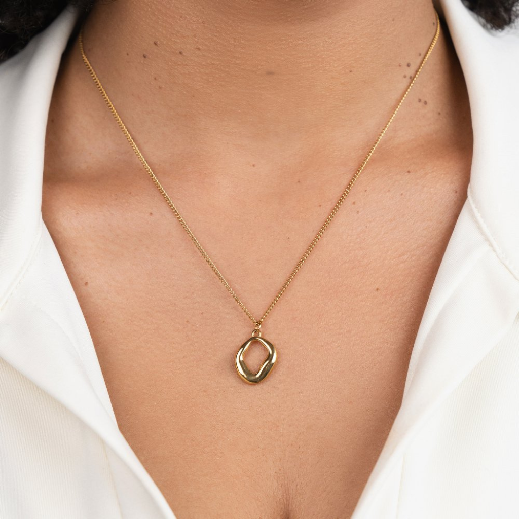 Gold Tone Geometric Necklace with Angular Pendant Design