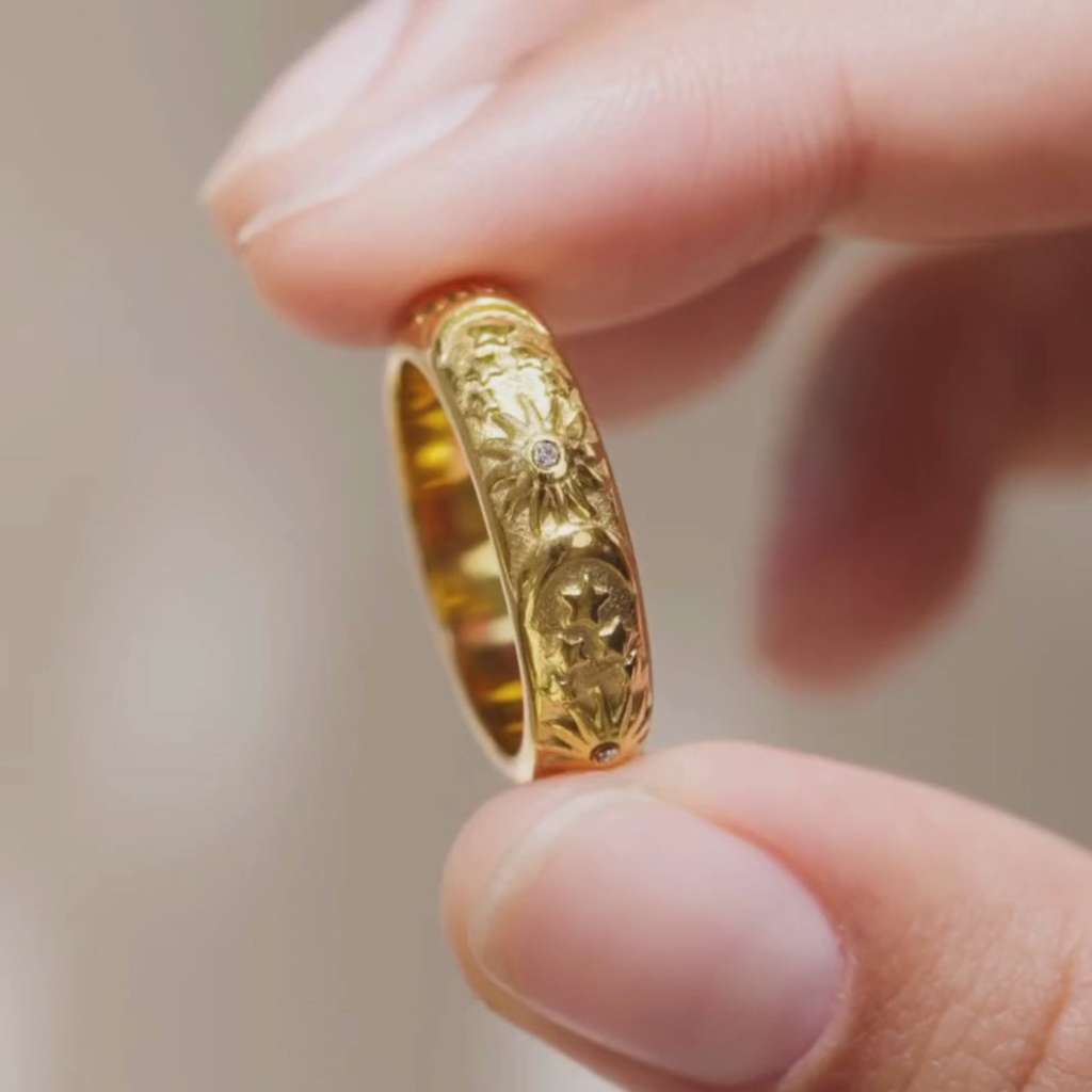 Celestial Ring with Sun and Star Engraving