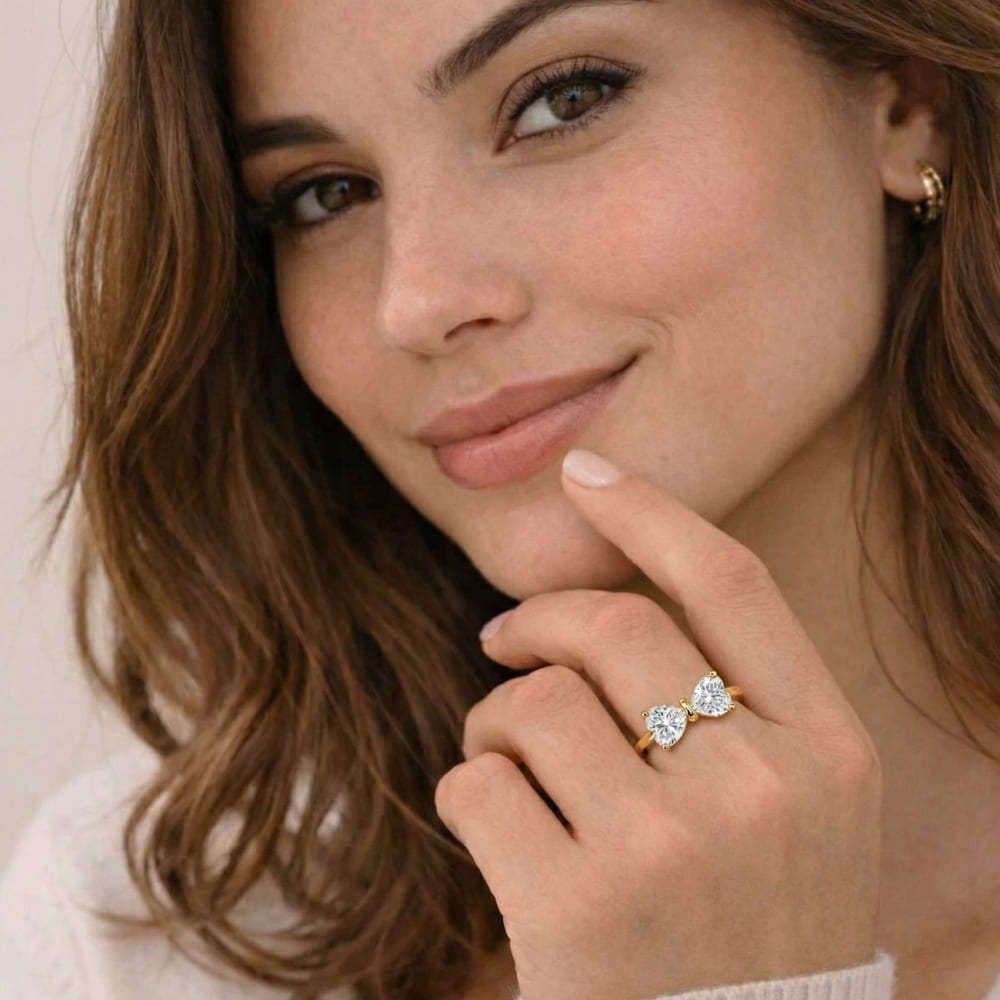 Gold Bow Ring with Radiant Stone Center