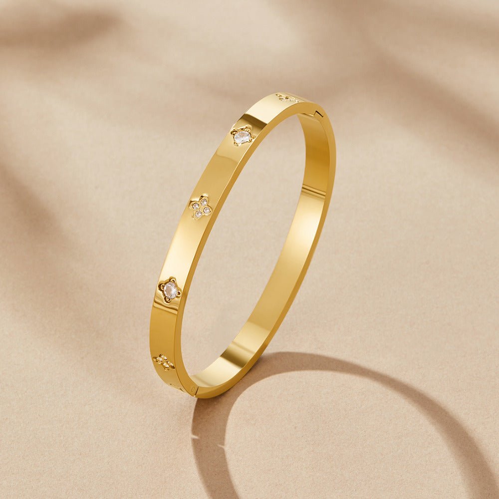 Gold Bangle with Clover Design