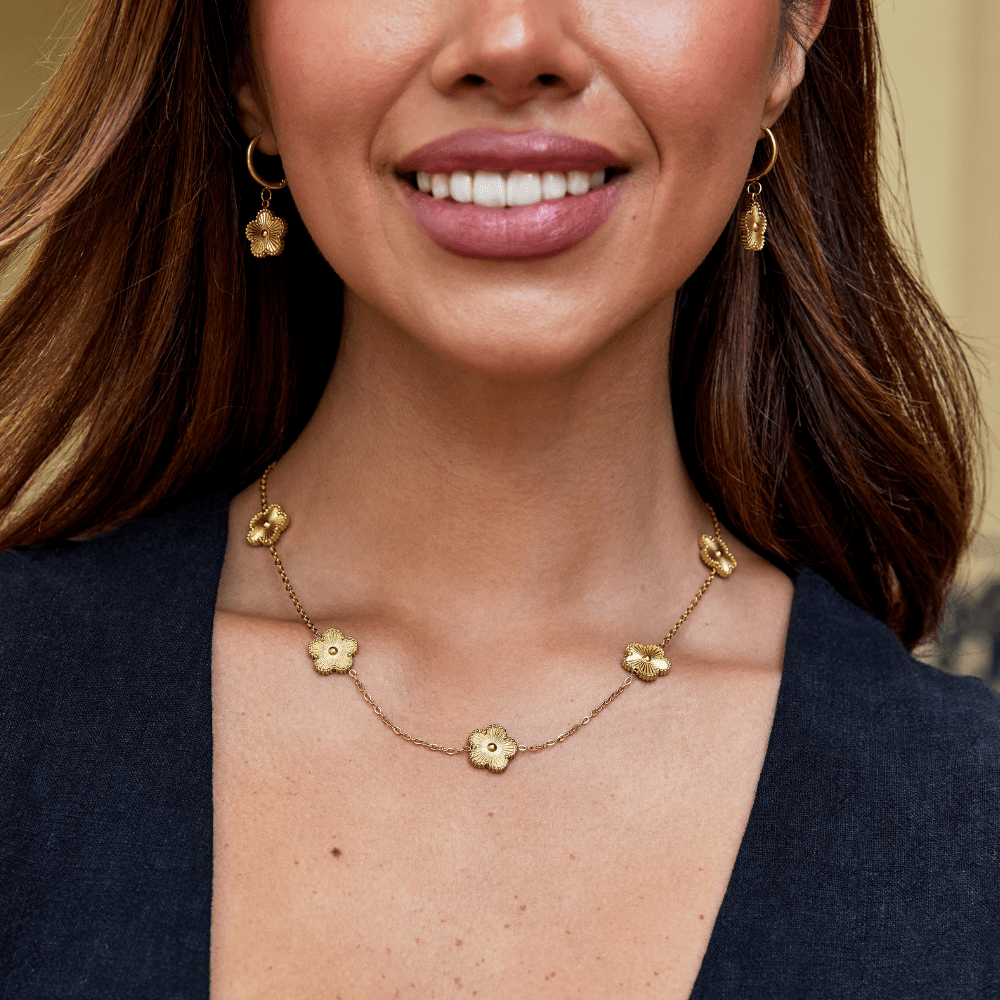 Gold Cluster Necklace with Four-Leaf Clover Design