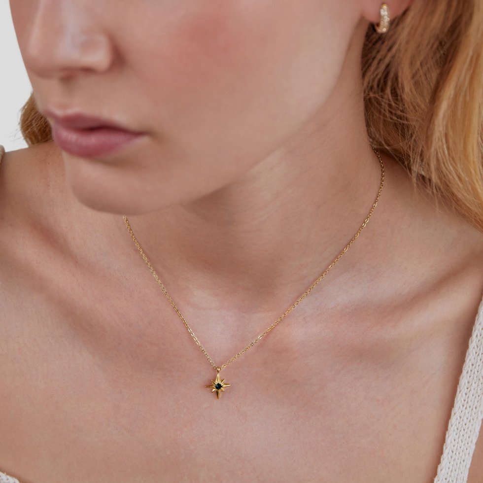 Gold Star Pendant Necklace with Emerald Crystal