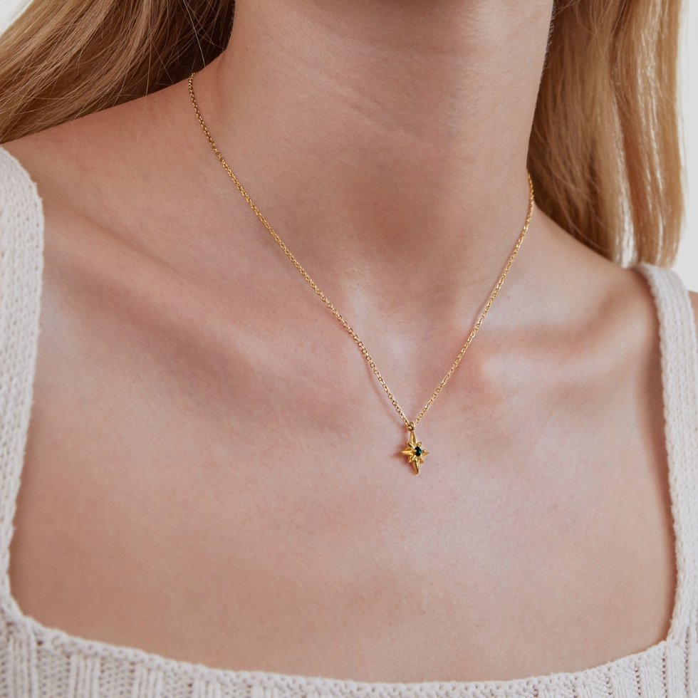 Gold Star Pendant Necklace with Emerald Crystal
