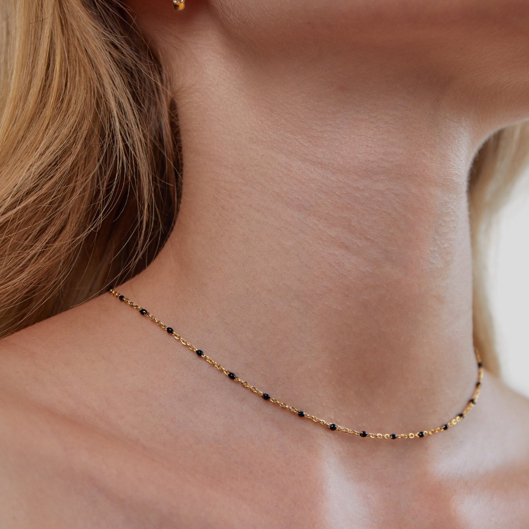 Gold Tone Necklace with Black Beads