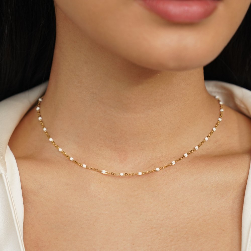 Gold Beaded Necklace with White Bead Strand