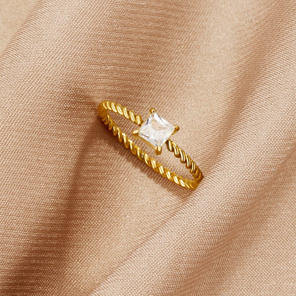 Gold Twisted Ring with Crystal Stone