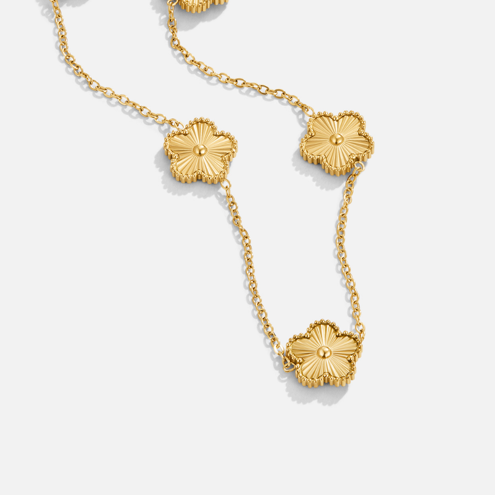 Gold Cluster Necklace with Four-Leaf Clover Design