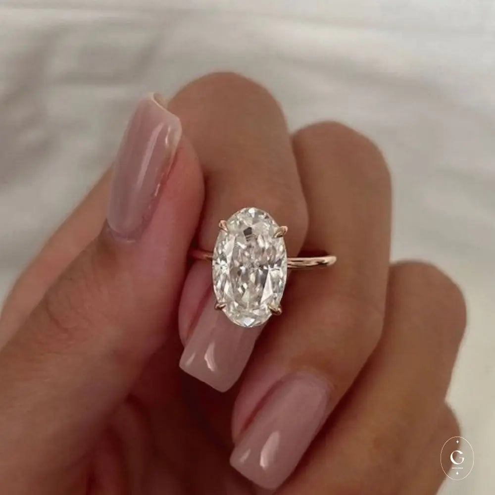 Gold Solitaire Ring with Moissanite Stone