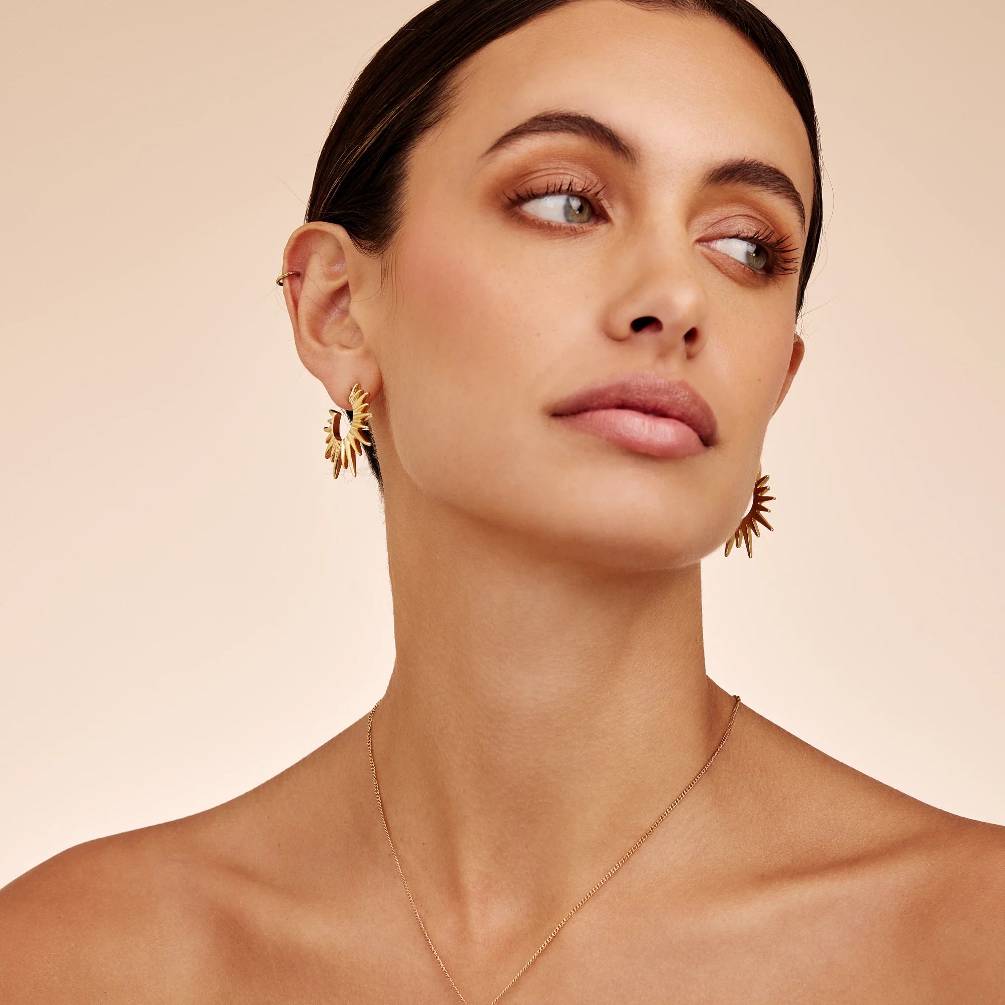 Gold Sunburst Hoop Earrings with Radiating Spike Design