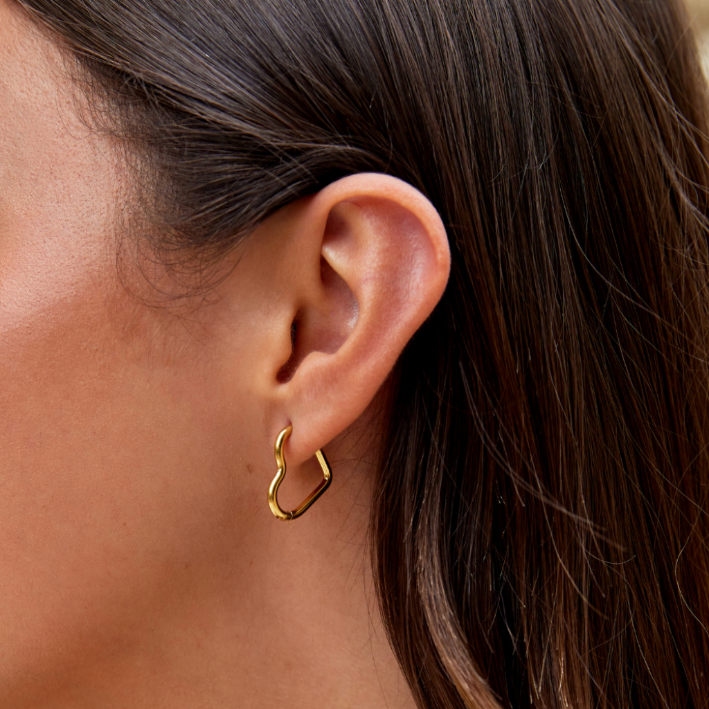 Gold Hoop Earrings with Heart Detail