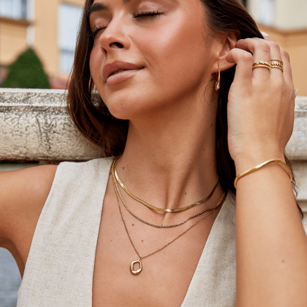 Gold Tone Geometric Necklace with Angular Pendant Design