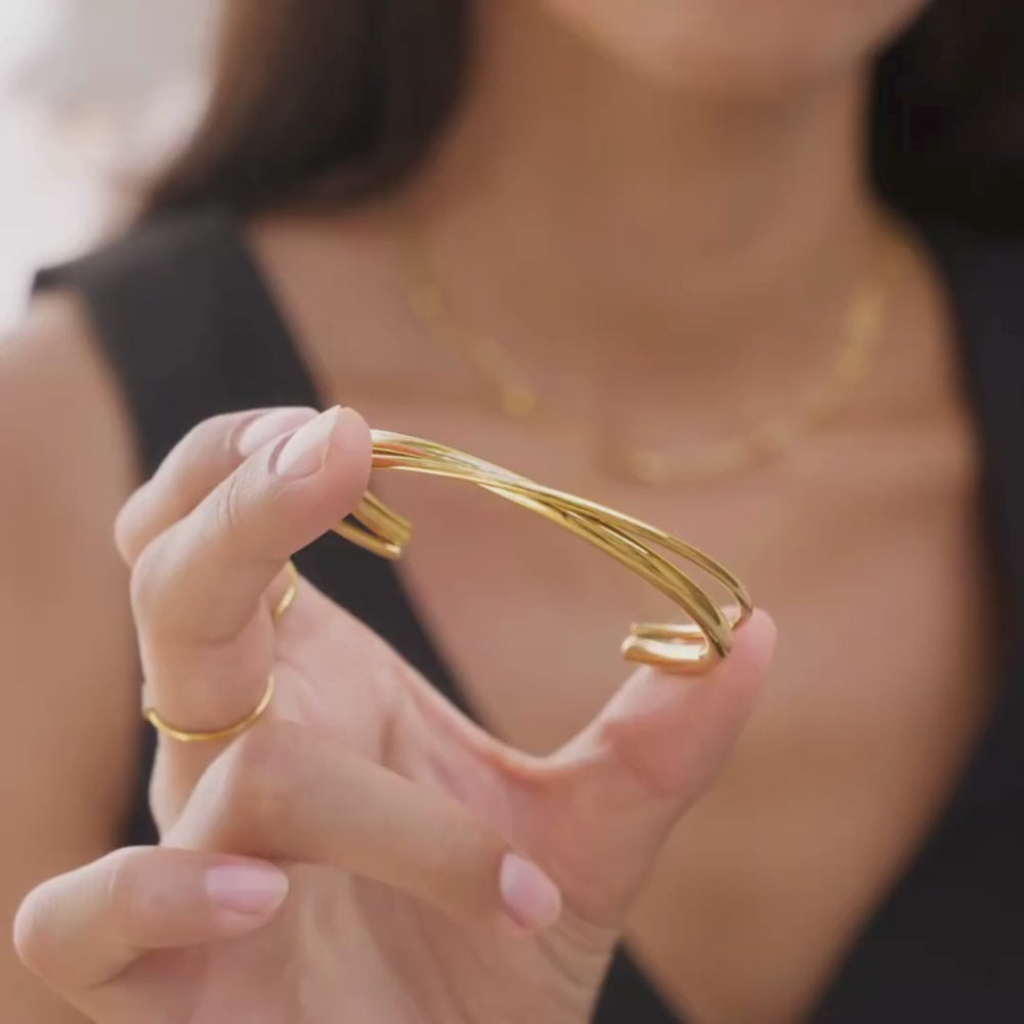 Gold Plated Twisted Cuff Bracelet with Cross Design