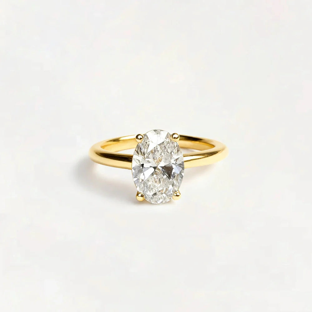 Gold Solitaire Ring with Moissanite Stone