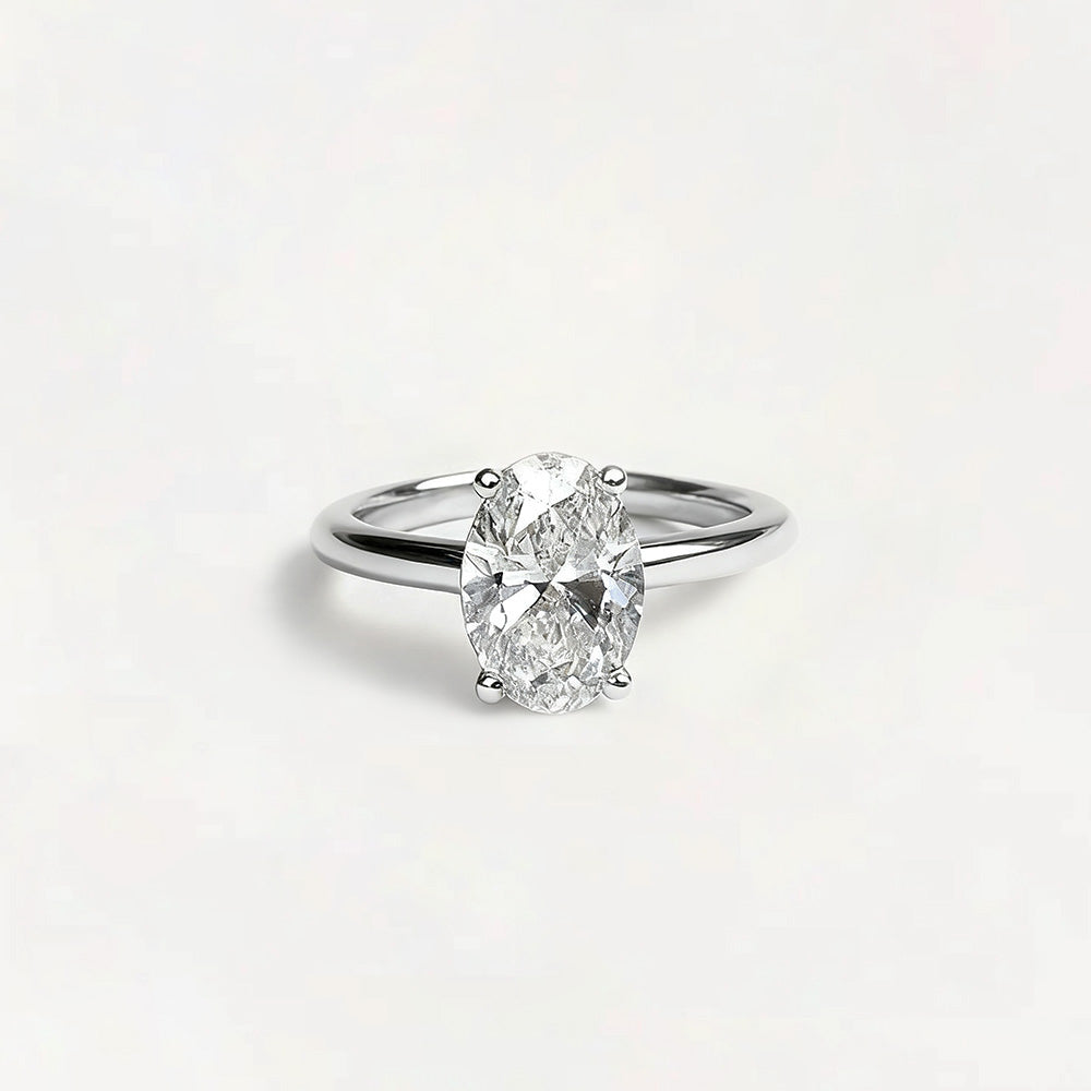 Gold Solitaire Ring with Moissanite Stone