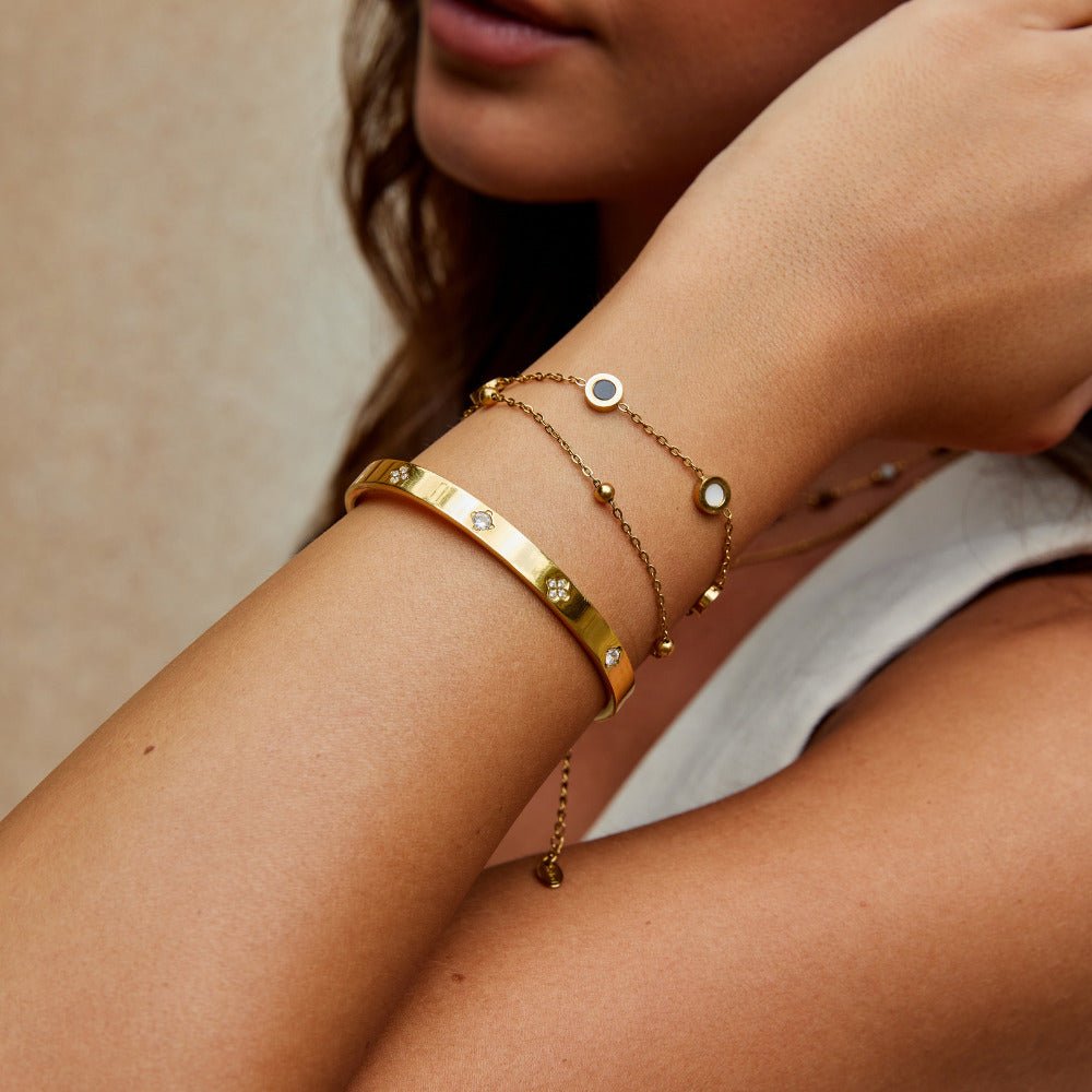 Gold Bangle with Clover Design