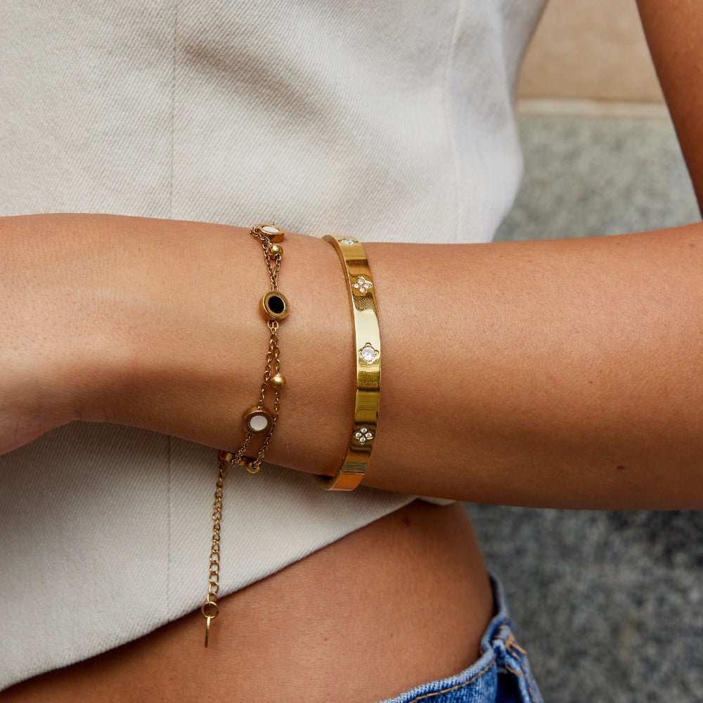 Gold Bangle with Clover Design