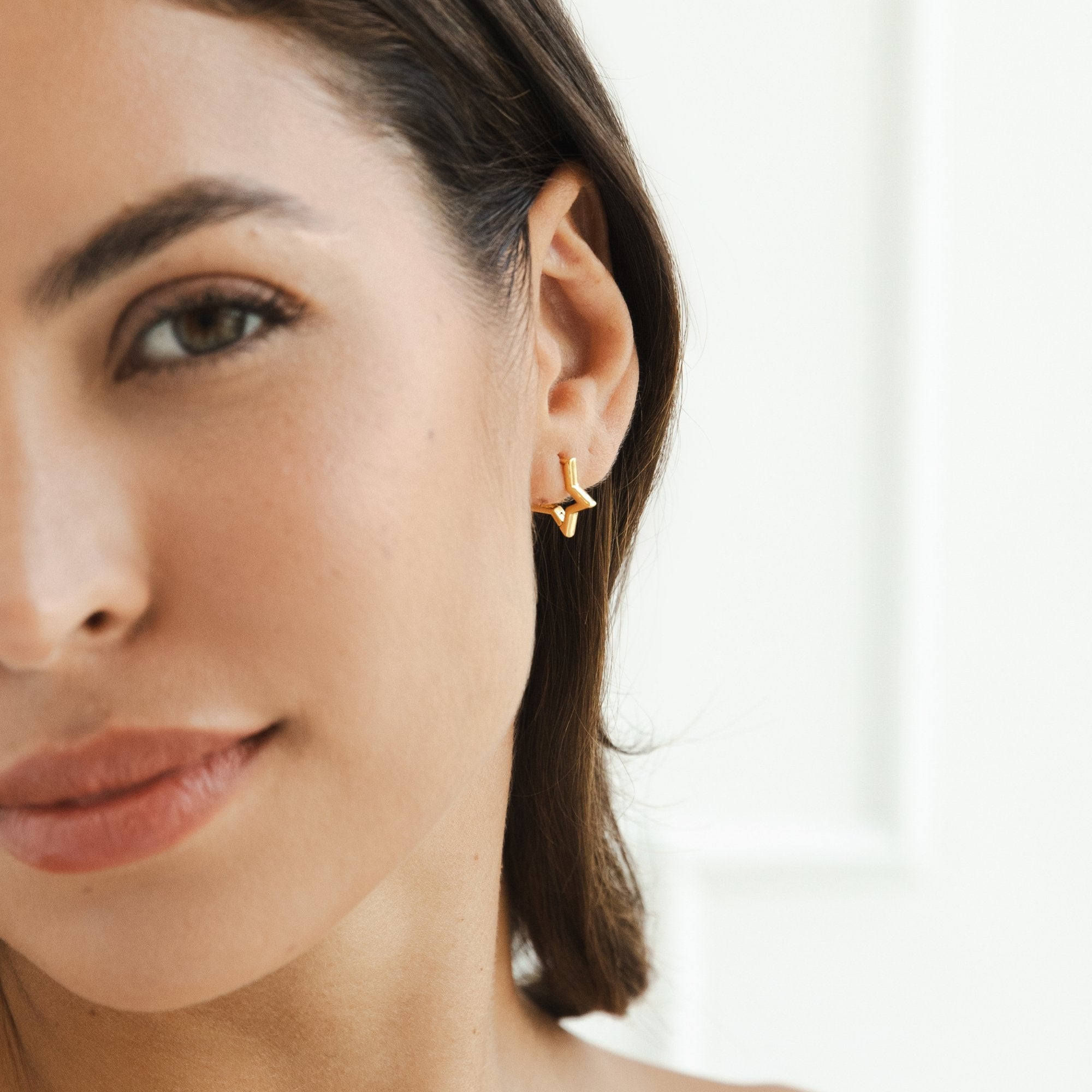 Gold Hoop Earrings with Star Detail