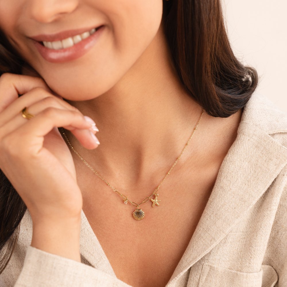 Gold Tone Seashell and Starfish Pendant Necklace