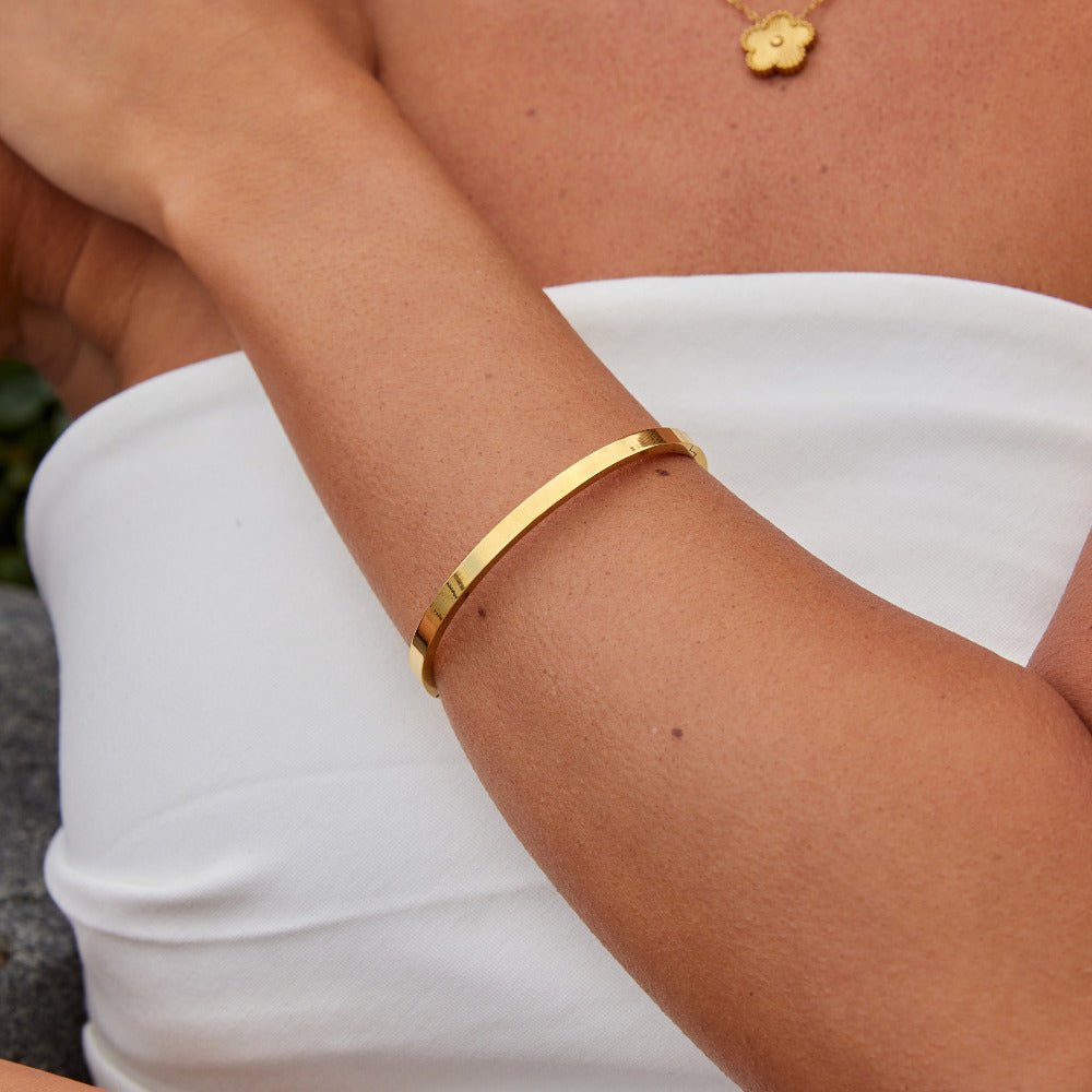 Gold Bangle with Smooth Curved Band