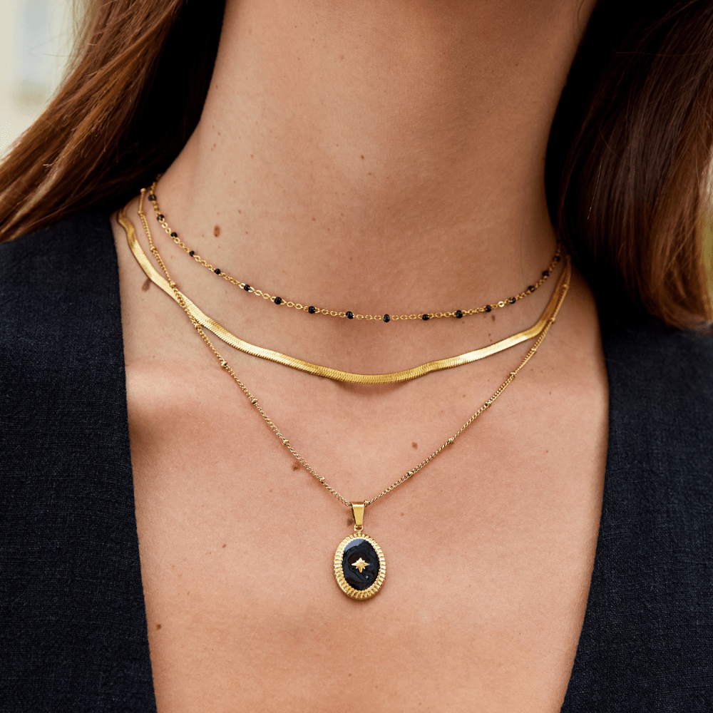 Gold Tone Necklace with Black Beads