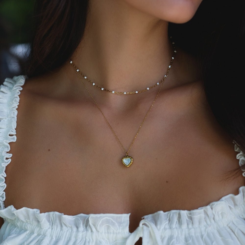 Gold Beaded Necklace with White Bead Strand