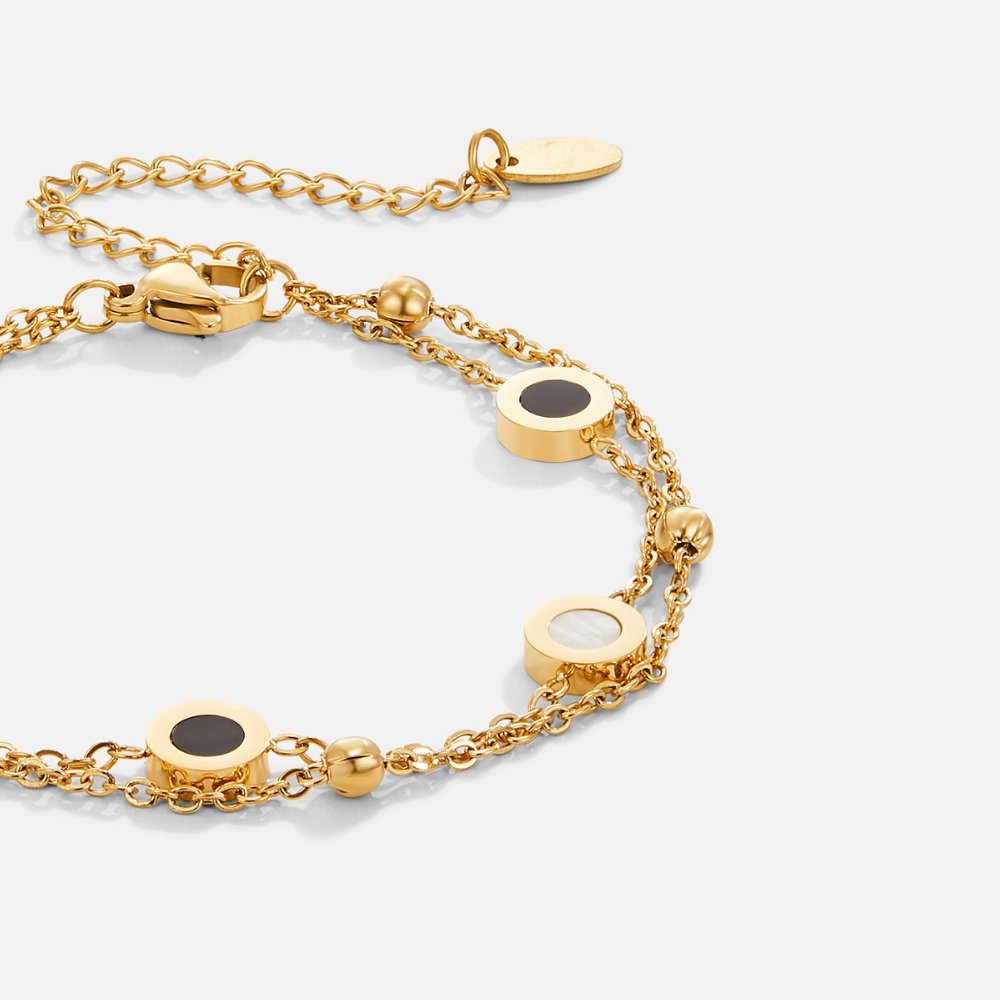 Gold Bracelet with Onyx and White Stone
