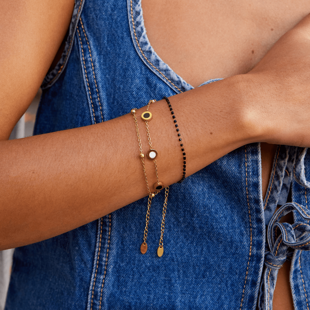 Gold Bracelet with Onyx and White Stone