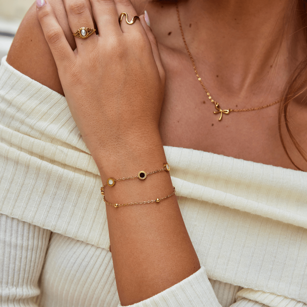 Gold Bracelet with Onyx and White Stone