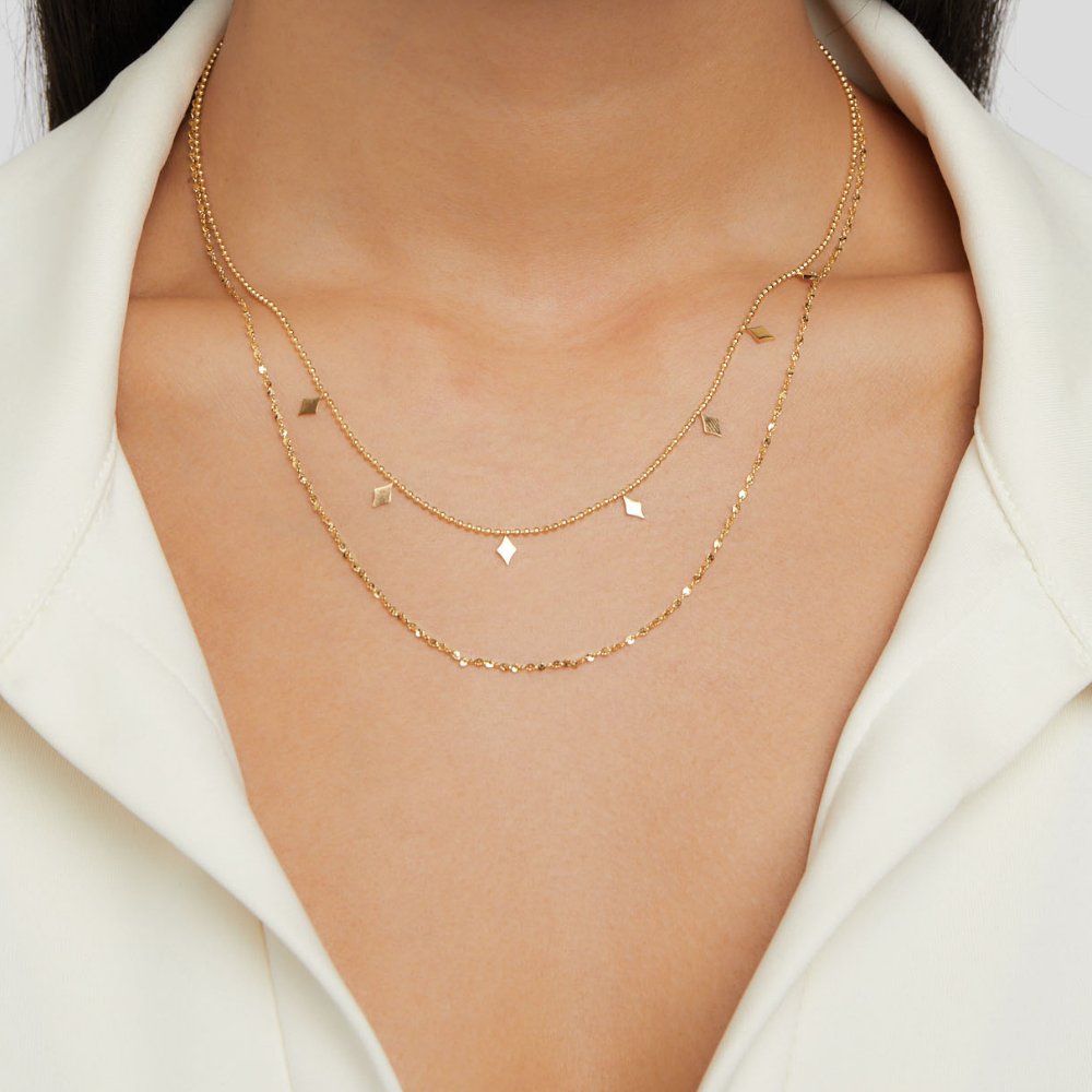Gold Layered Necklace with Phoenix Pendant