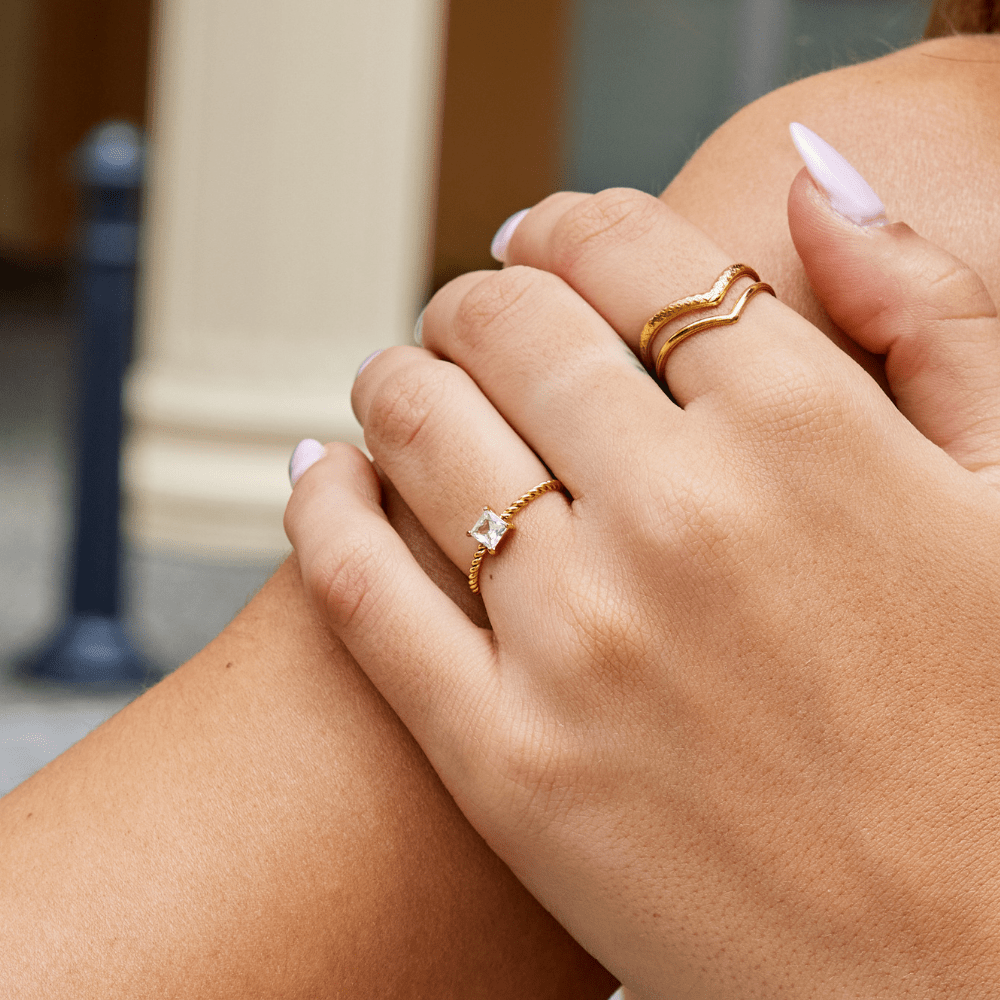 Gold Twisted Ring with Crystal Stone